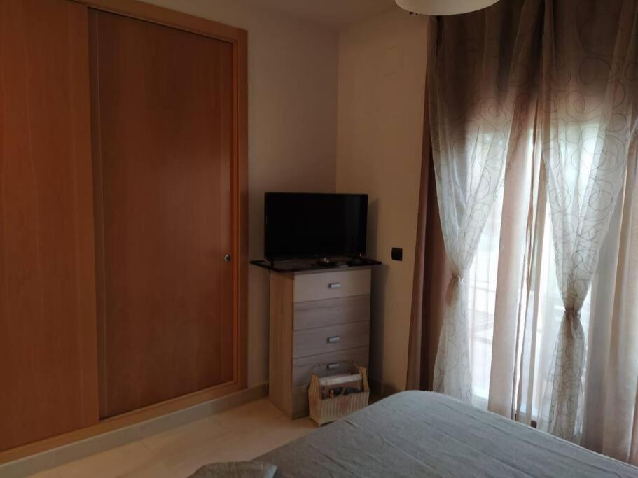 Bajo Puerta De Alcazaba Appartement Retamar  Buitenkant foto